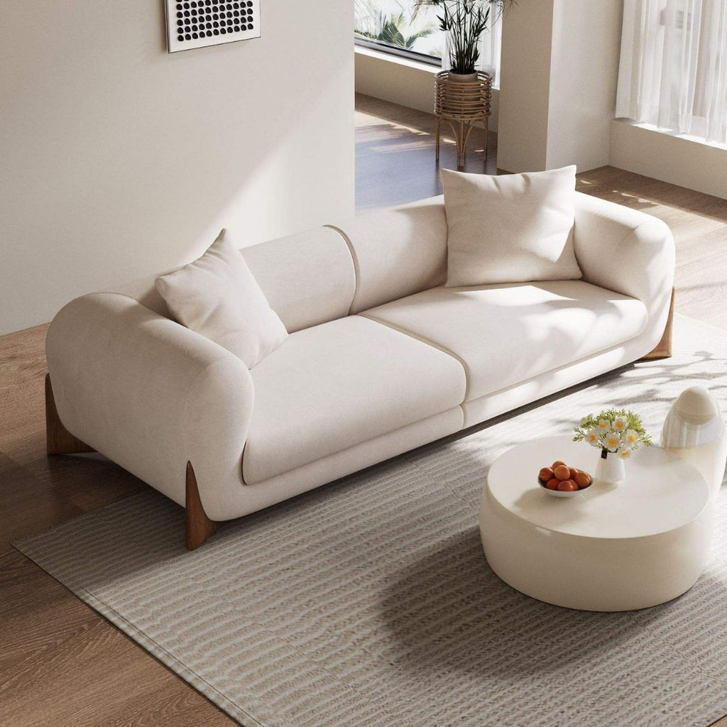 Elegant 3-seter sofa i kremfarget bouclé