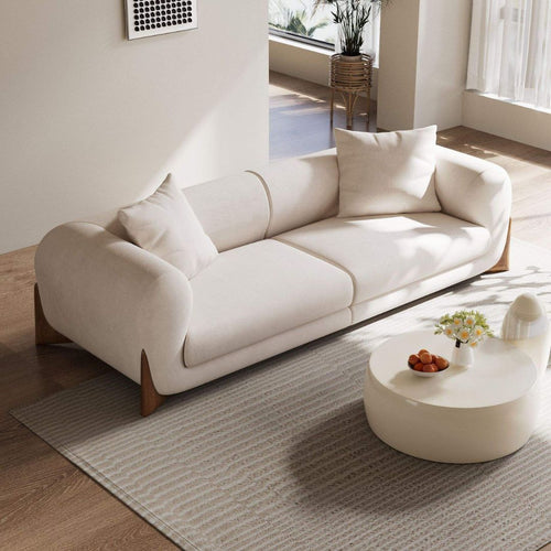 Elegant 3-seter sofa i kremfarget bouclé