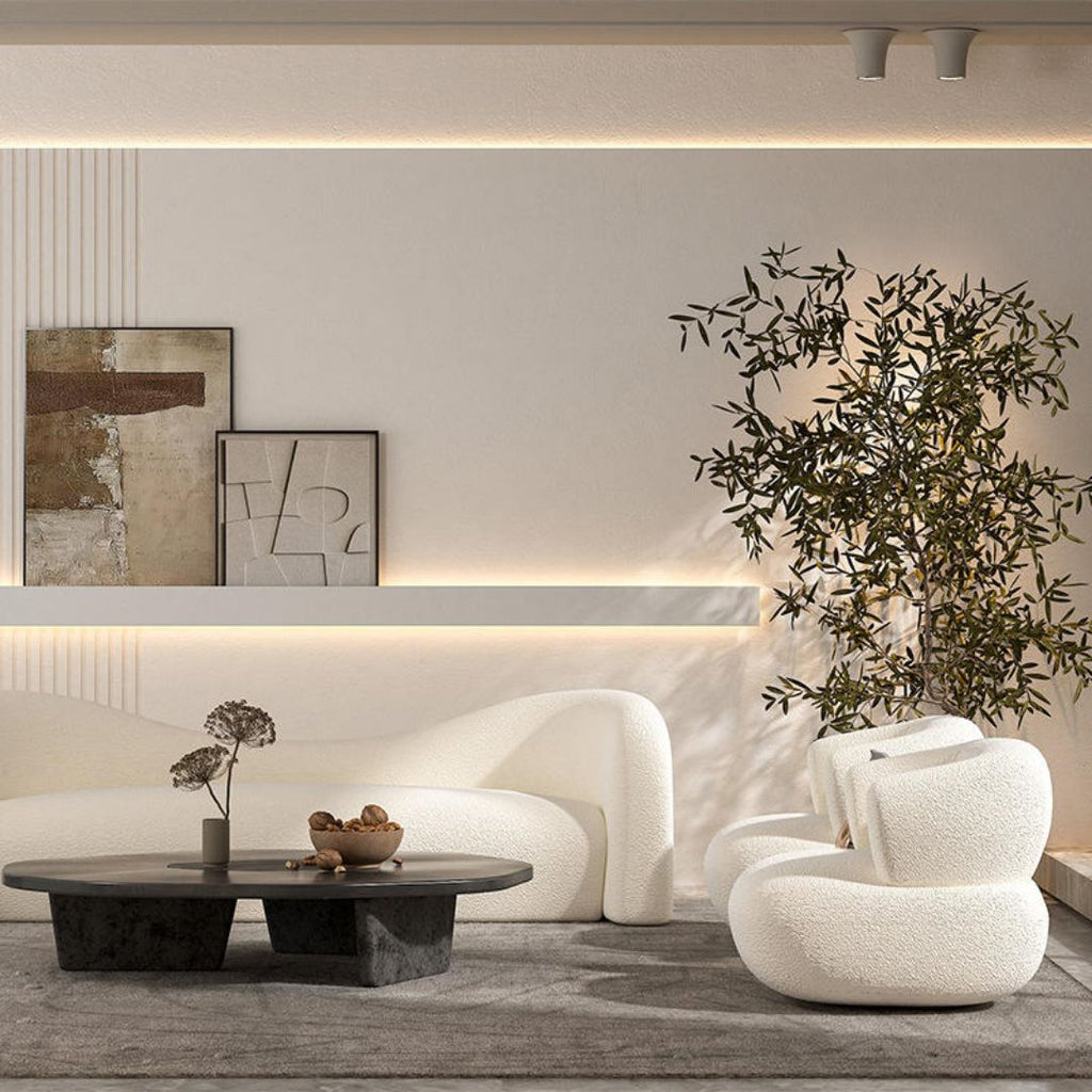 Luksuriøs buet sofa i hvit boucle